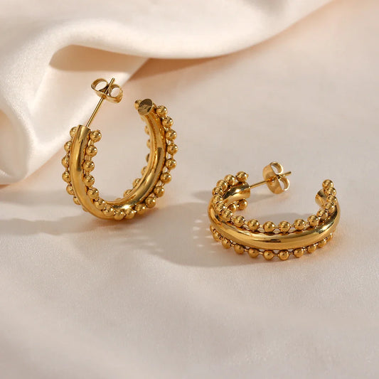 Goldene Creolen Ohrringe
