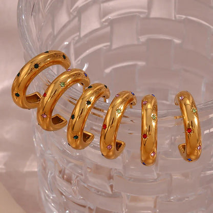 Goldene Creolen-Ohrringe